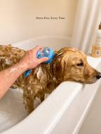 PawBrush Pro in use washing a golden retriever in the bathtub - Stress-Free, Every Time